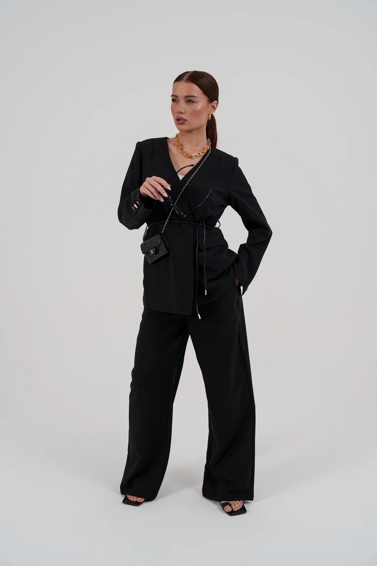 Black suit with belt