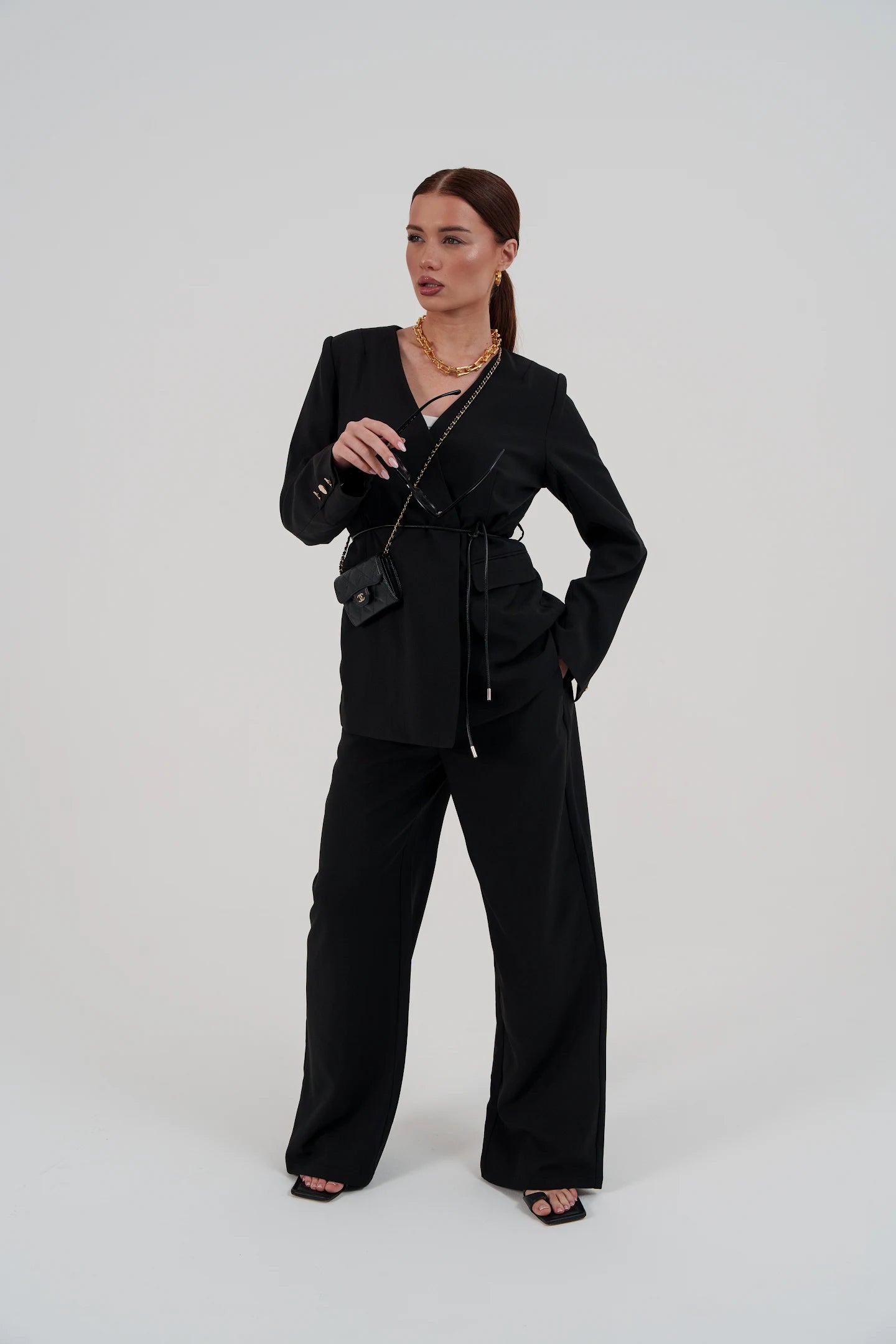 Black suit with belt