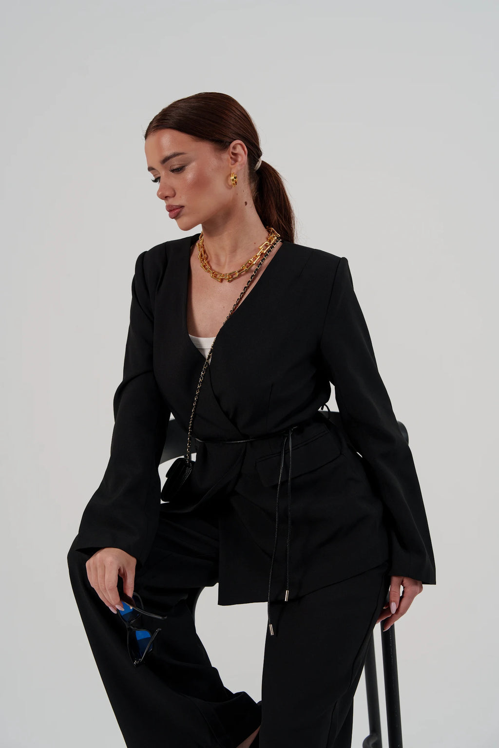 Black suit with belt