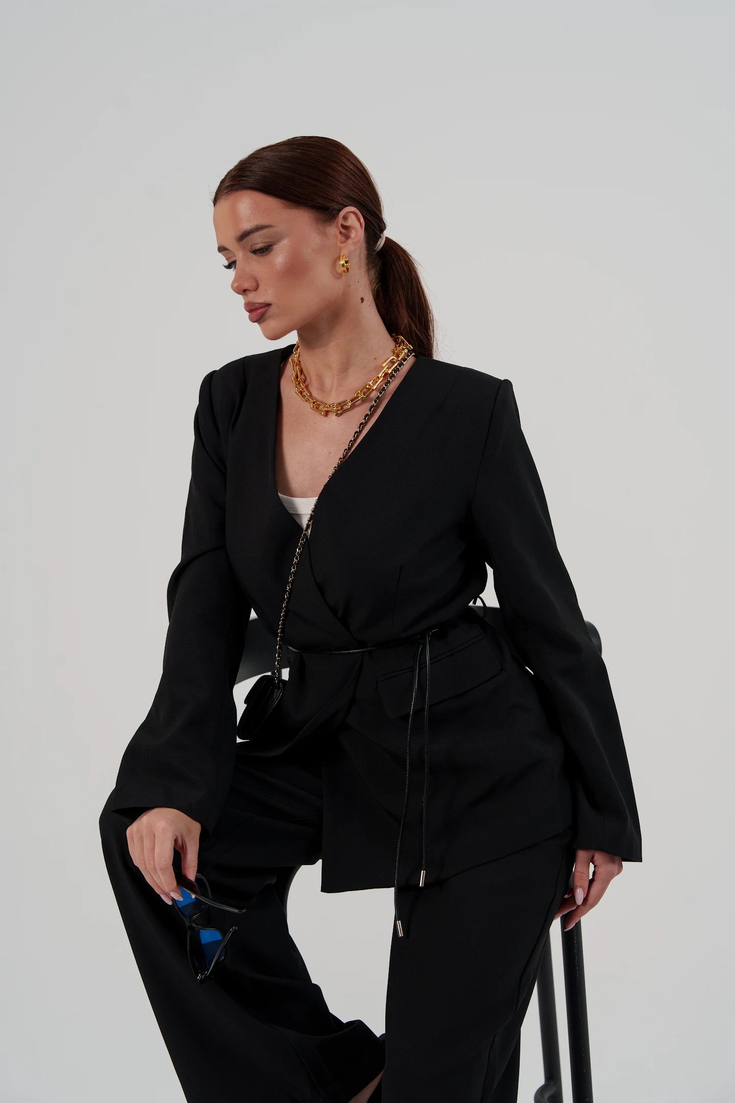 Black suit with belt